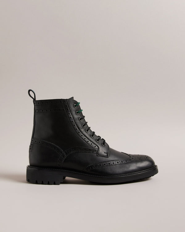 JAKOBE-Boots-Step up your footwear game with our JAKOBE leather boots. Crafted from top grain leather, these boots boast a lace fastening with eye-catching two-tone laces that add a touch of unique charm. The laser-cut brogue details provide a dash of classic style, while the heel pull tab ensures easy on-and-off. Leather boots Top grain leather Lace fastening Two-tone laces Laser cut brogue details Heel pull tab Vulcanised rubber sole- Ted Baker Romania